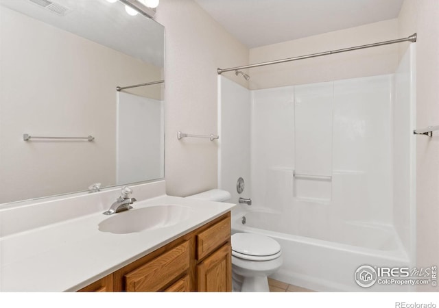 bathroom with toilet, bathing tub / shower combination, visible vents, tile patterned flooring, and vanity