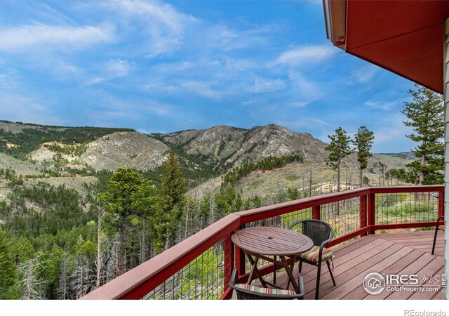 deck featuring a mountain view