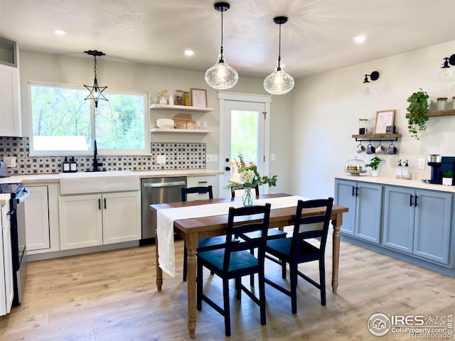 237 Clover Ln, Fort Collins, CO 80521 - dining room featuring plenty of natural light, light wood-style floors, and recessed lighting