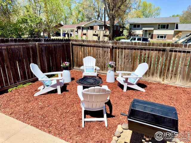 237 Clover Ln, Fort Collins, CO 80521 - fenced backyard with a residential view and a fire pit