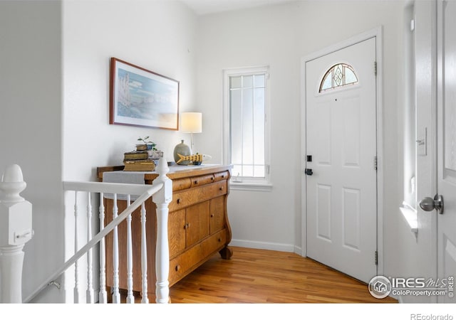 112 Cobble Dr, Windsor, CO 80550 - entrance foyer featuring light wood finished floors and baseboards