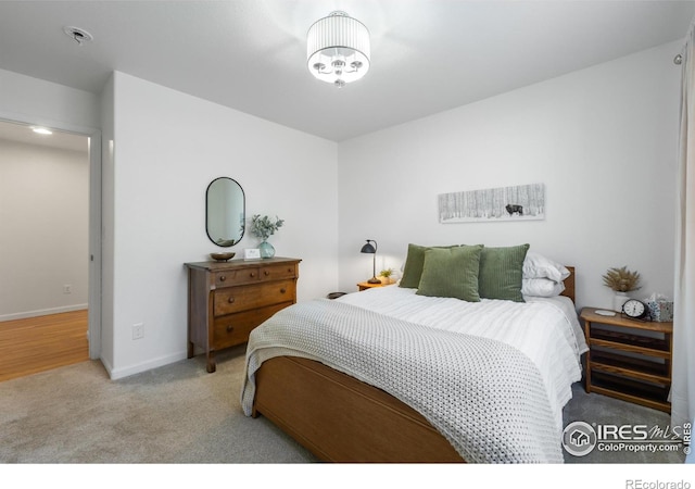 112 Cobble Dr, Windsor, CO 80550 - bedroom with baseboards and carpet flooring