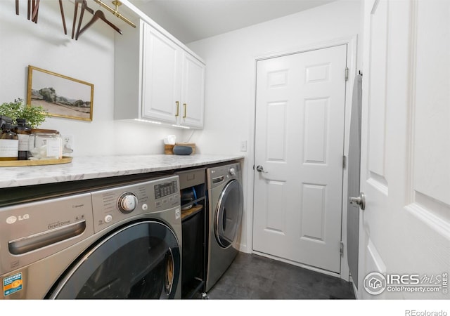 112 Cobble Dr, Windsor, CO 80550 - clothes washing area featuring washer and dryer and cabinet space