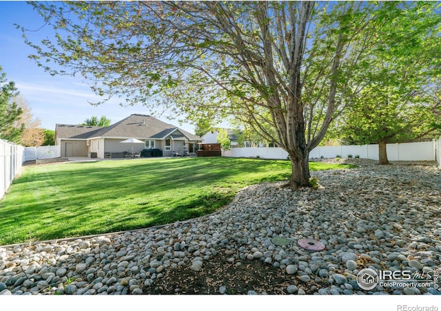 112 Cobble Dr, Windsor, CO 80550 - view of yard featuring a fenced backyard and a patio