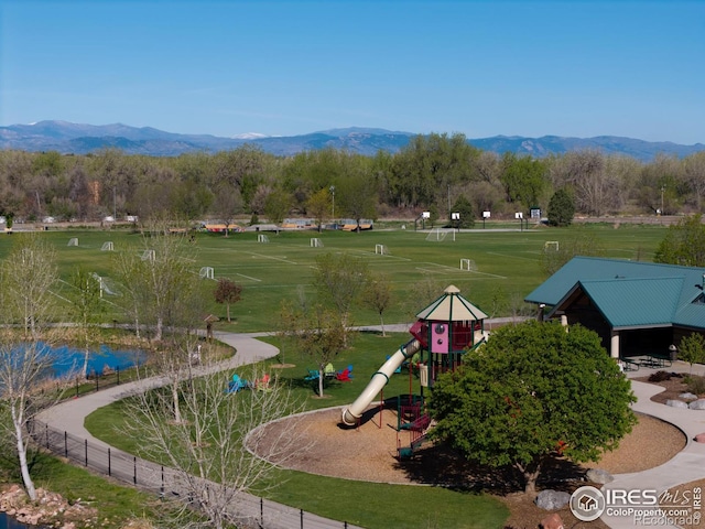 112 Cobble Dr, Windsor, CO 80550 - surrounding community featuring playground community and a mountain view