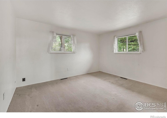 1629 Timber Ln, Boulder, CO 80304 - carpeted spare room featuring healthy amount of natural light