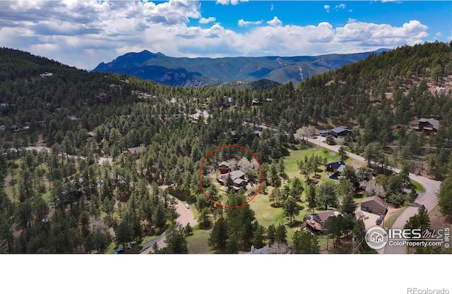 1629 Timber Ln, Boulder, CO 80304 - drone / aerial view of a forest and mountains