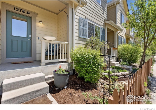 1278 Hummingbird Cir Unit D, Longmont, CO 80501 - entrance to property with fence