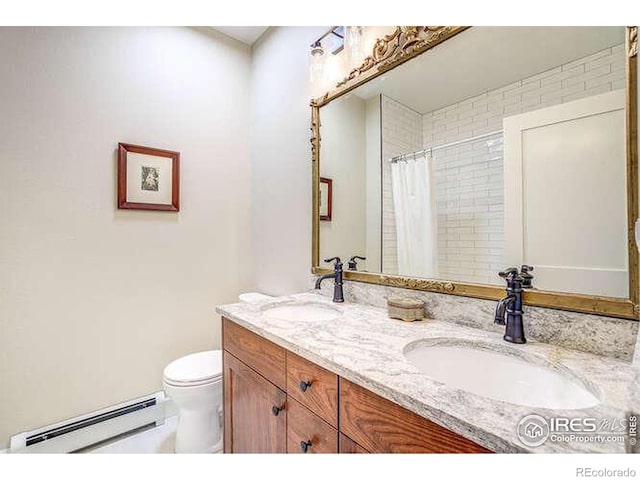 bathroom featuring a baseboard heating unit, toilet, double vanity, and a shower with shower curtain