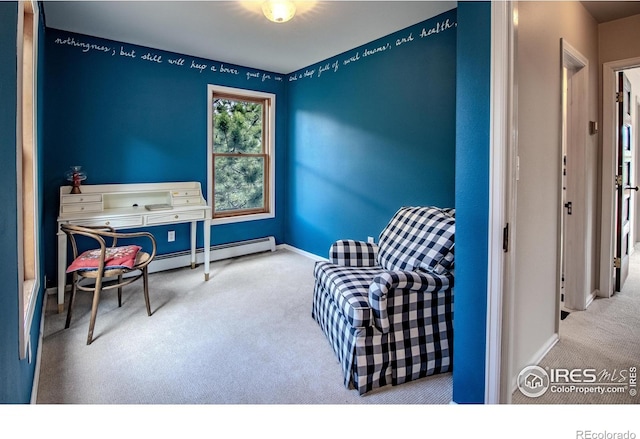 living area with carpet floors and baseboards
