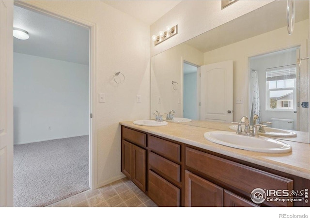 bathroom with double vanity