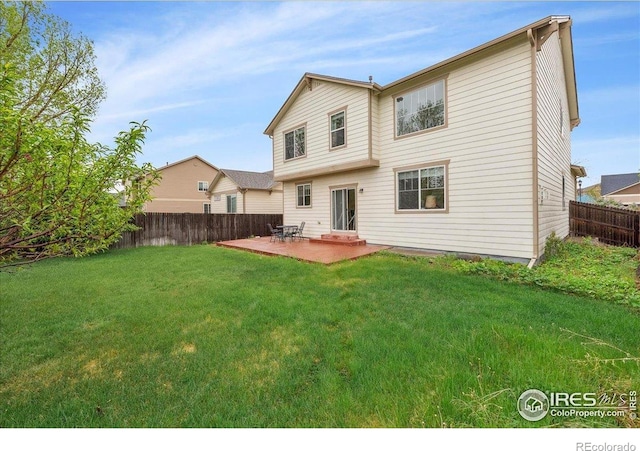 rear view of house with a patio area