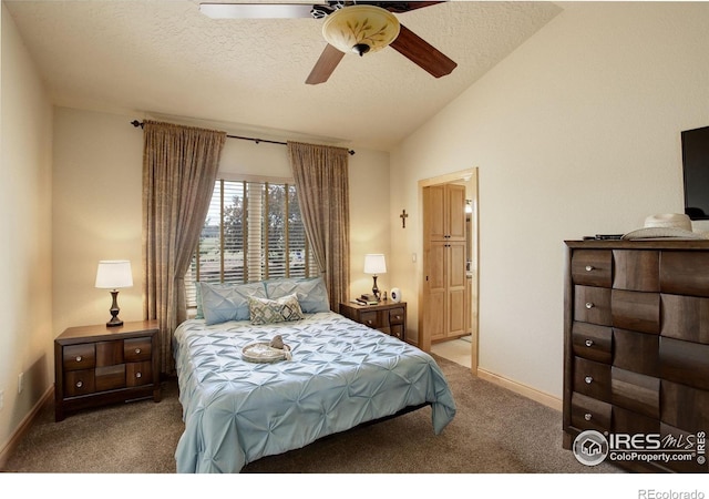 carpeted bedroom featuring ceiling fan, lofted ceiling, a textured ceiling, and baseboards