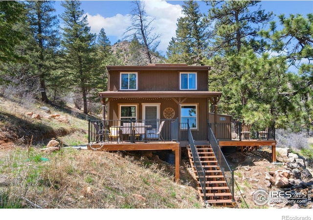 view of front of property with stairs