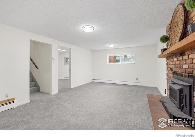 unfurnished living room featuring carpet flooring, stairway, baseboard heating, and a baseboard heating unit