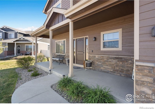 7084 Sumner St, Wellington, CO 80549 - view of patio / terrace with a porch