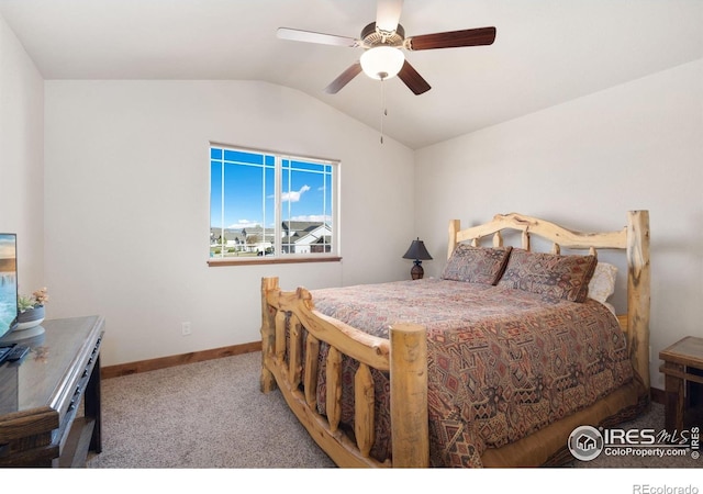 7084 Sumner St, Wellington, CO 80549 - carpeted bedroom with baseboards, ceiling fan, and vaulted ceiling