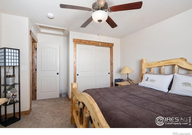 7084 Sumner St, Wellington, CO 80549 - carpeted bedroom featuring ceiling fan, attic access, baseboards, and a closet