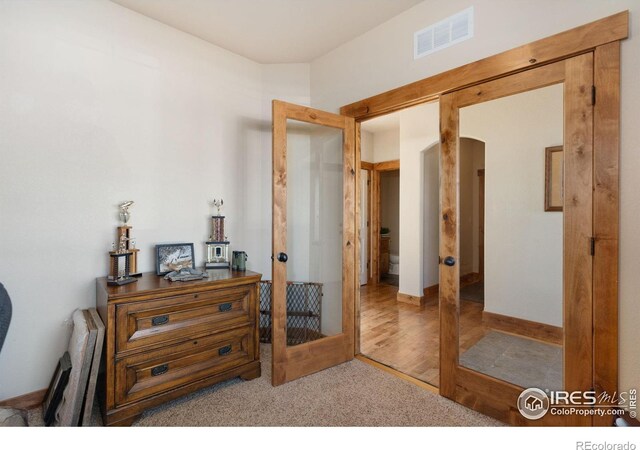 7084 Sumner St, Wellington, CO 80549 - interior space featuring baseboards, french doors, and visible vents