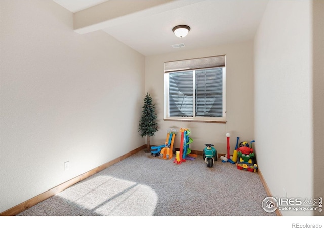 7084 Sumner St, Wellington, CO 80549 - rec room with carpet, baseboards, visible vents, and beamed ceiling