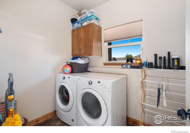 7084 Sumner St, Wellington, CO 80549 - clothes washing area featuring cabinet space, independent washer and dryer, and baseboards