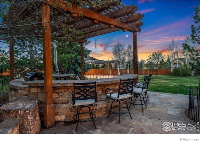 14582 Homestead Pl, Broomfield, CO 80023 - patio terrace at dusk with a pergola