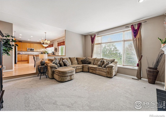 10305 Charissglen Cir, Highlands Ranch, CO 80126 - living area with a chandelier, recessed lighting, and light colored carpet