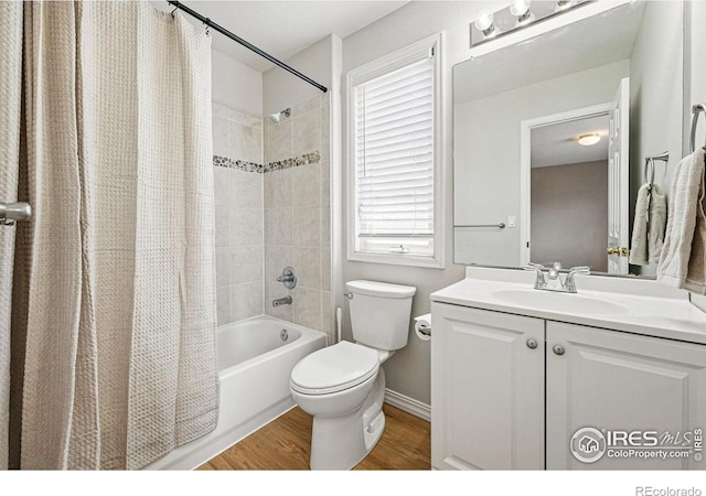 10305 Charissglen Cir, Highlands Ranch, CO 80126 - full bathroom featuring shower / bath combo, vanity, and wood finished floors