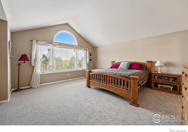10305 Charissglen Cir, Highlands Ranch, CO 80126 - bedroom with lofted ceiling and carpet floors