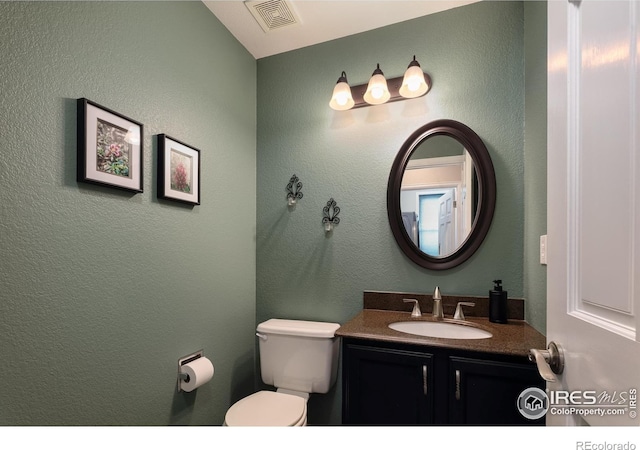 1809 Keel Ct, Lafayette, CO 80026 - bathroom featuring toilet, vanity, and visible vents
