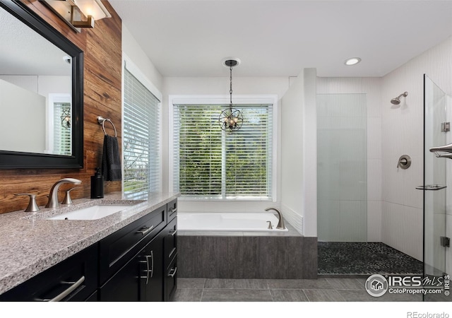 1809 Keel Ct, Lafayette, CO 80026 - bathroom featuring recessed lighting, walk in shower, a bath, tile patterned flooring, and vanity
