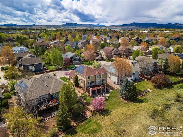 bird's eye view with a mountain view and a residential view