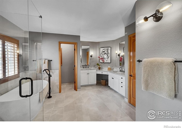 2206 Eagles Nest Dr, Lafayette, CO 80026 - full bath with a soaking tub and vanity