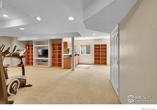 2206 Eagles Nest Dr, Lafayette, CO 80026 - exercise room featuring light colored carpet, baseboard heating, and recessed lighting