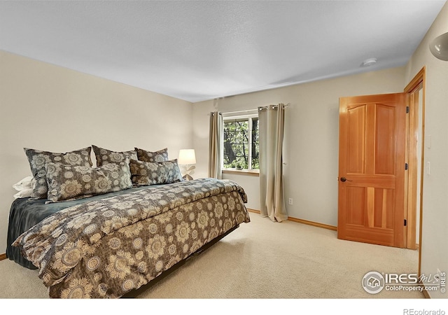 2206 Eagles Nest Dr, Lafayette, CO 80026 - carpeted bedroom featuring baseboards
