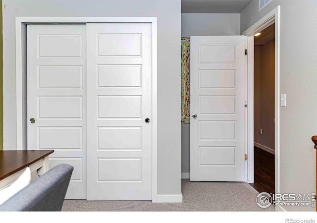 506 Bobcat Ct, Wiggins, CO 80654 - bedroom featuring baseboards, a closet, and carpet floors