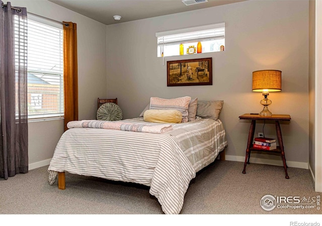 506 Bobcat Ct, Wiggins, CO 80654 - carpeted bedroom with baseboards