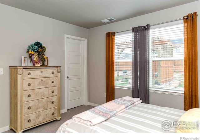 506 Bobcat Ct, Wiggins, CO 80654 - bedroom with carpet flooring and baseboards