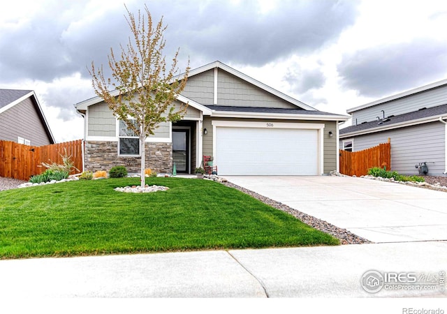 506 Bobcat Ct, Wiggins, CO 80654 - craftsman-style house featuring driveway and an attached garage