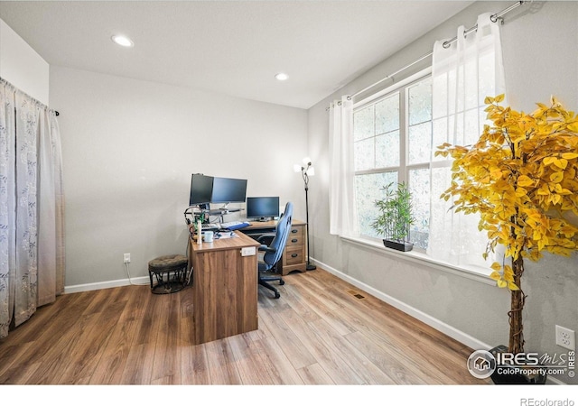 office with wood finished floors, baseboards, and recessed lighting