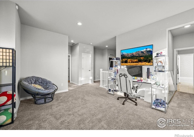 carpeted office space with recessed lighting and baseboards