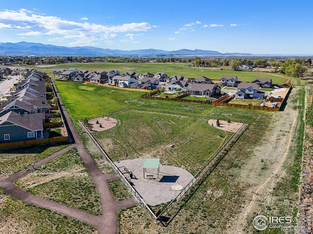 aerial perspective of suburban area featuring a mountainous background
