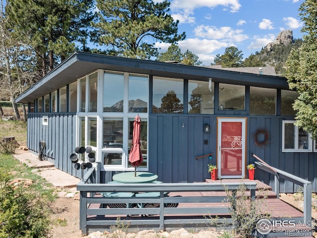 1411 Vail Ct, Estes Park, CO 80517 - view of outdoor structure with a sunroom
