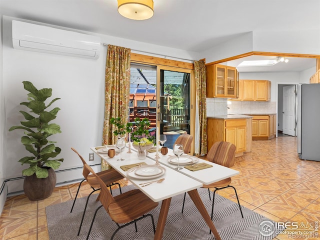 1411 Vail Ct, Estes Park, CO 80517 - dining space featuring a wall mounted air conditioner and a baseboard heating unit