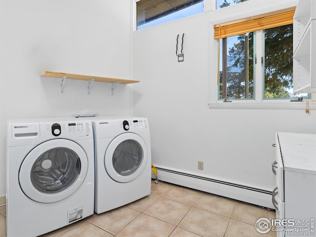 1411 Vail Ct, Estes Park, CO 80517 - laundry area featuring a baseboard radiator, separate washer and dryer, and light tile patterned floors