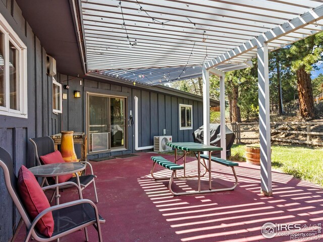 1411 Vail Ct, Estes Park, CO 80517 - view of patio / terrace featuring a pergola and ac unit