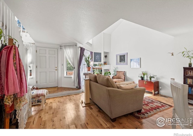 5086 Buckingham Rd, Boulder, CO 80301 - living area with wood finished floors and a textured ceiling