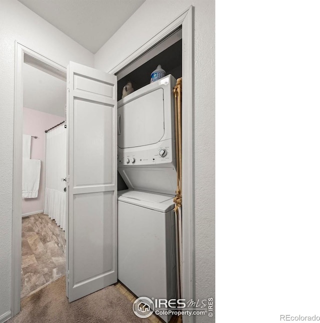 5086 Buckingham Rd, Boulder, CO 80301 - washroom featuring stacked washer / drying machine
