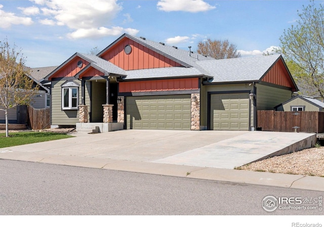 9137 Harlequin Cir, Frederick, CO 80504 - craftsman-style house with board and batten siding, a garage, fence, and roof with shingles