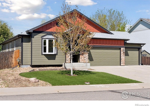9137 Harlequin Cir, Frederick, CO 80504 - view of front of house featuring board and batten siding, a garage, and concrete driveway